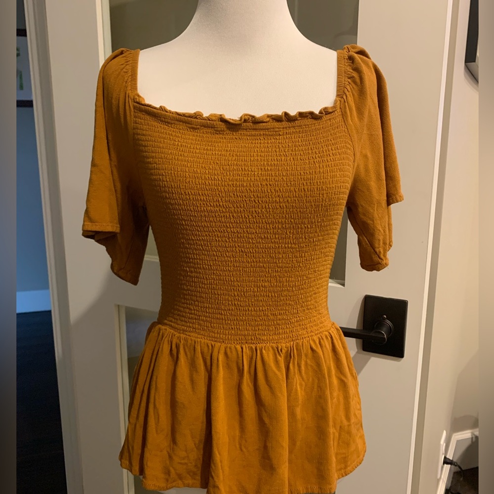 Market and spruce peplum top
